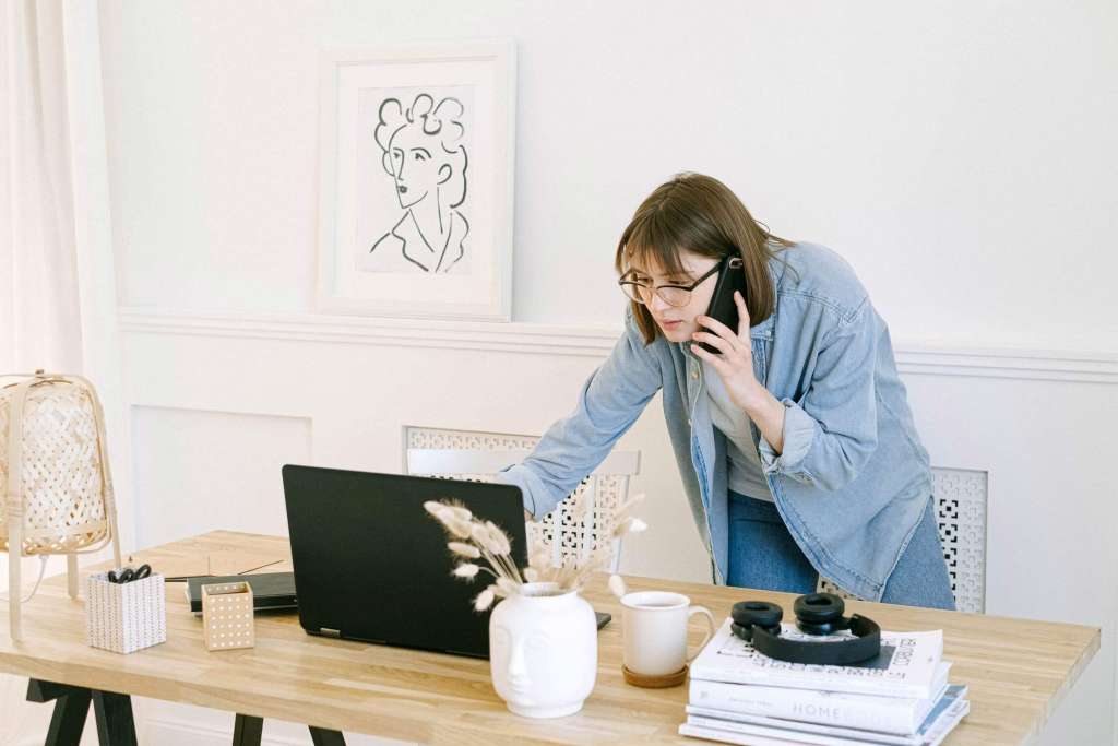 The girl using her laptop.